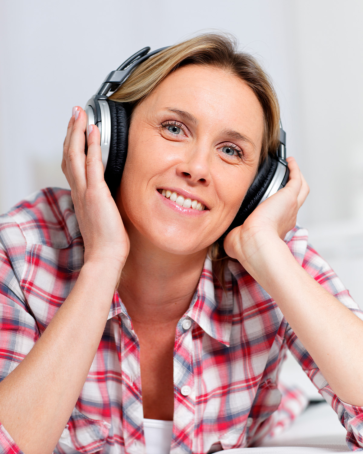 Woman listening to a personalised Mother's Day song